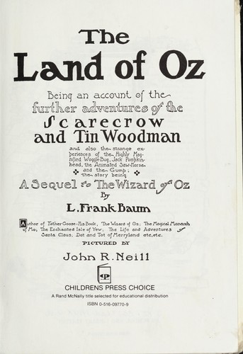 The Land of Oz : being an account of the further adventures of the Scarecrow and Tin Woodman ... : A sequel to The Wizard of Oz